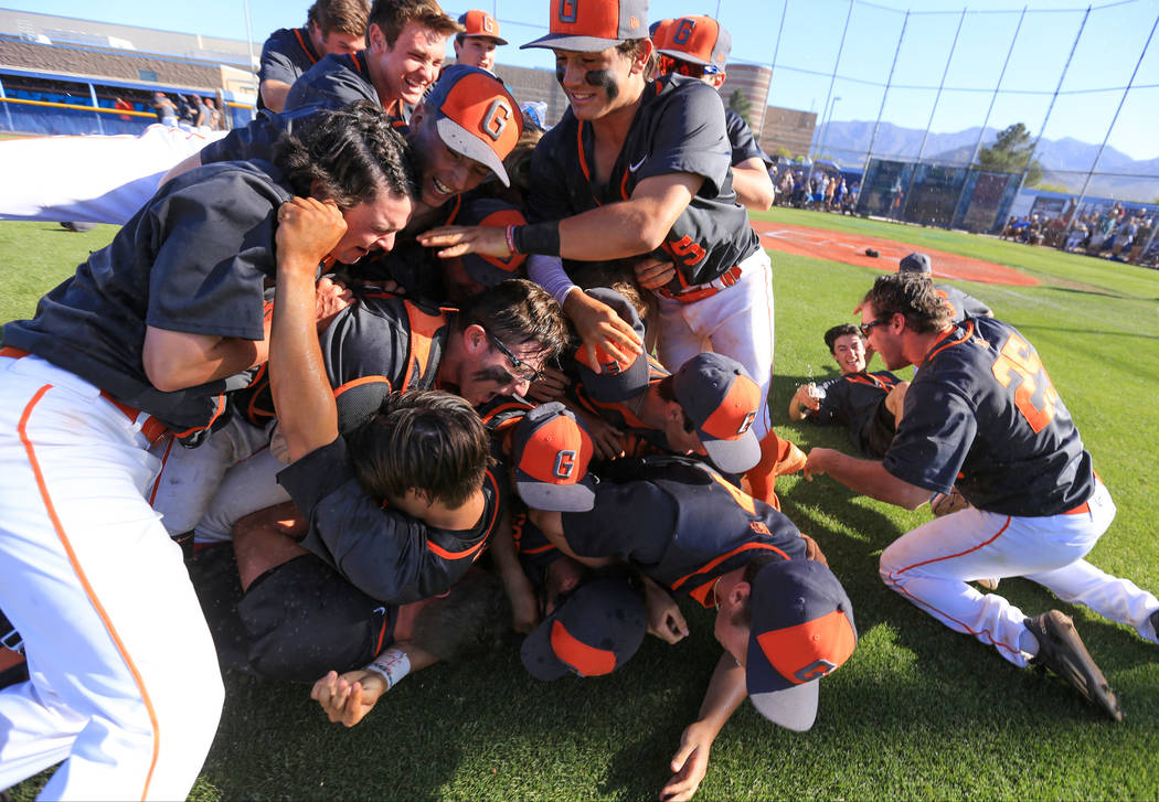 Bishop Gorman players celebrate winning the Sunset Region baseball championship game over Ce ...