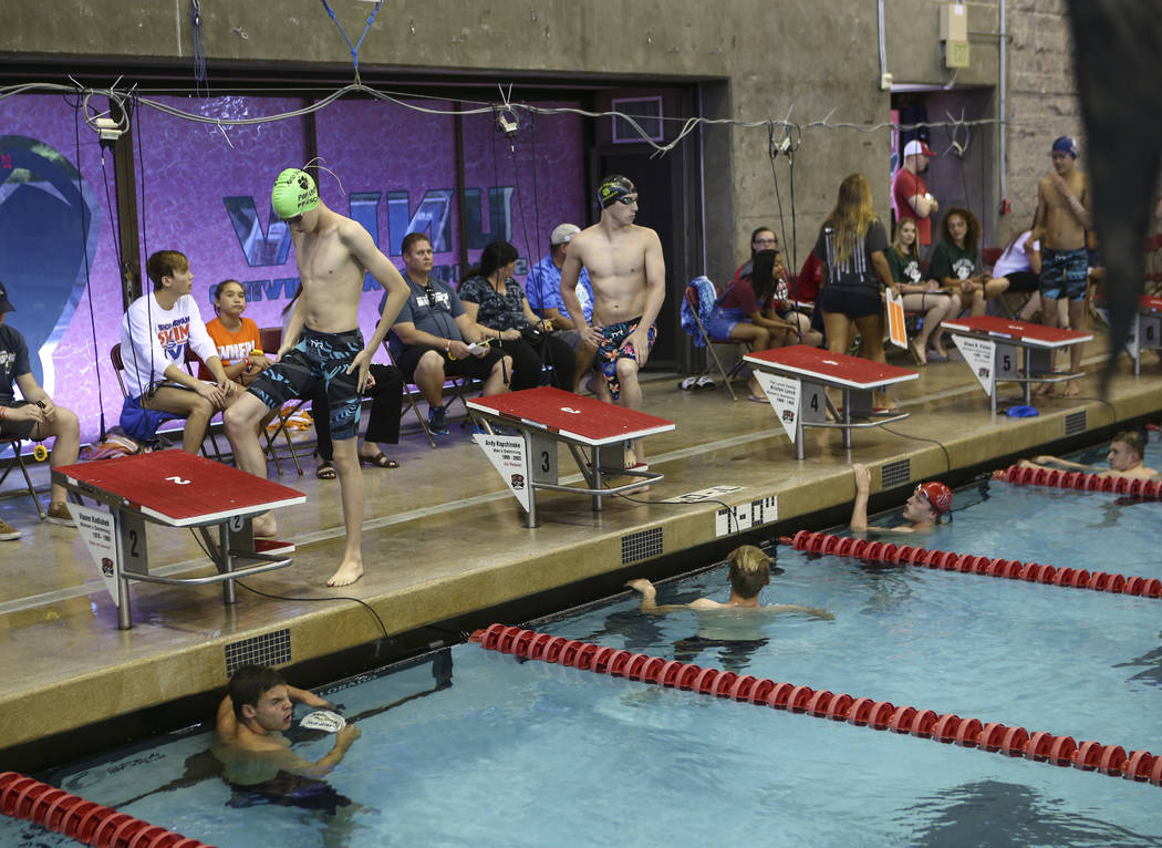 Competitors prepare for the 500 yard freestyle during the Sunset Region swim tournament at B ...