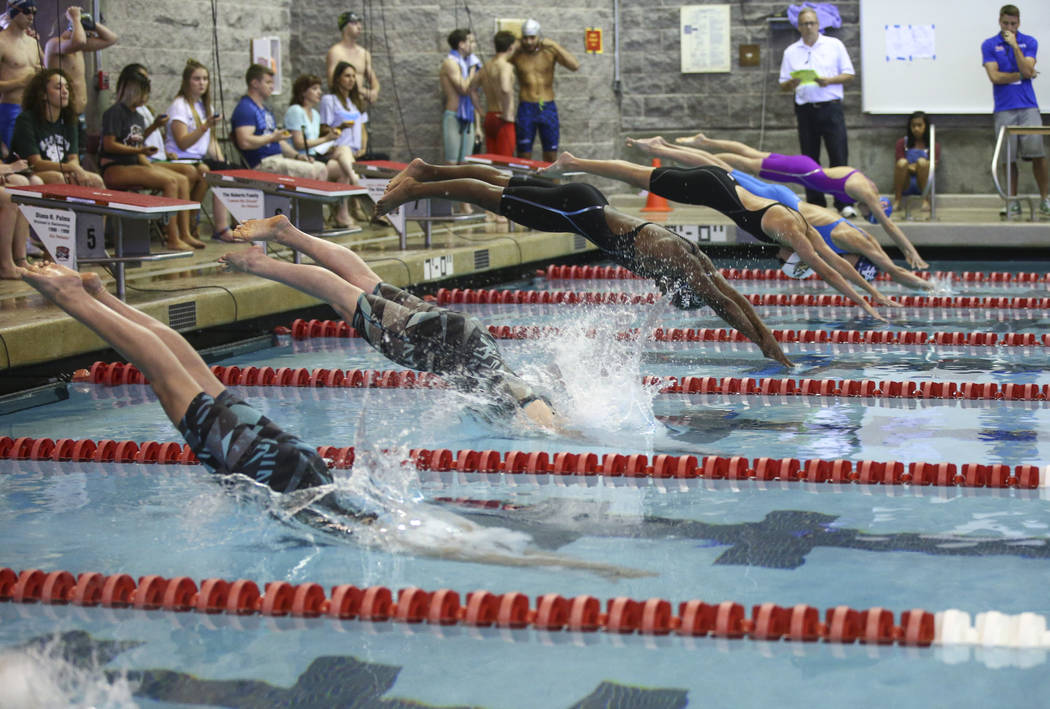 Palo Verde’s Emelia Piccininni, left, and Allie Emery, second from left, compete in th ...