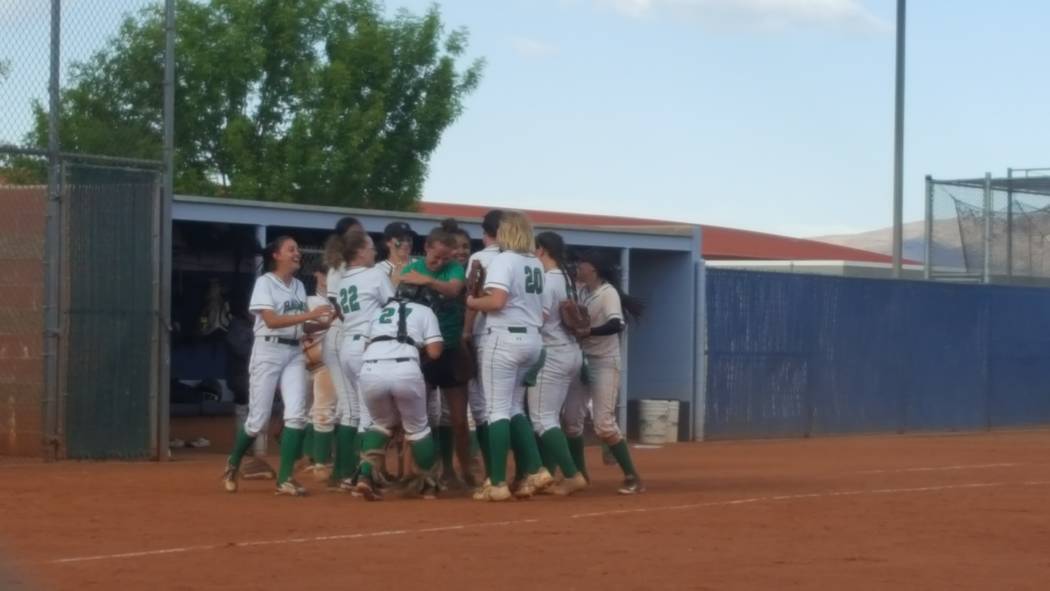 Rancho’s softball team celebrates its 3-1 victory over Sierra Vista in the Class 4A st ...