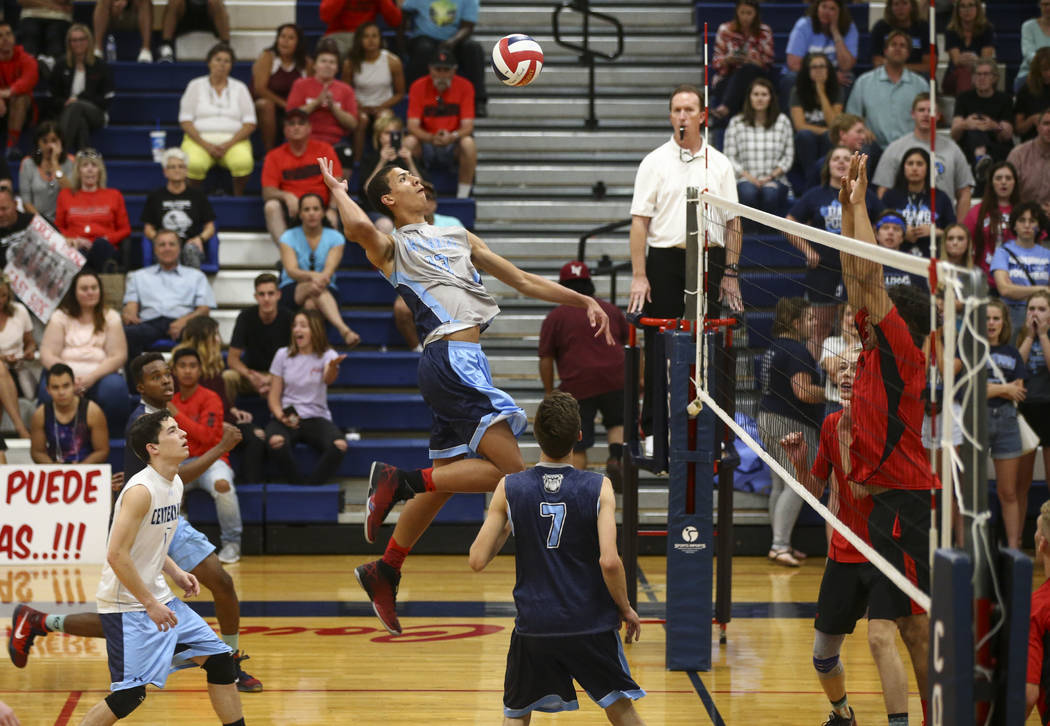 Centennial’s Teon Taylor (13) looks to send the ball over to Las Vegas during the Clas ...