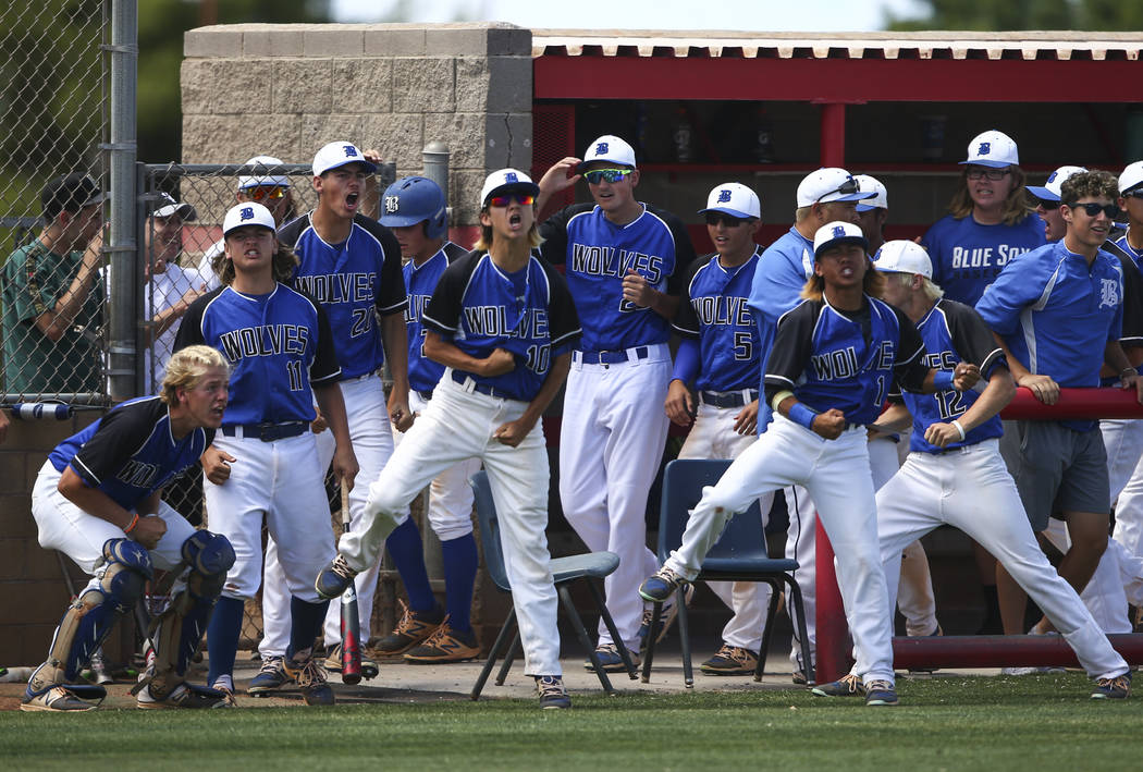 Basic players react after a home run by Basic’s Garrett Giles, not pictured, during a ...