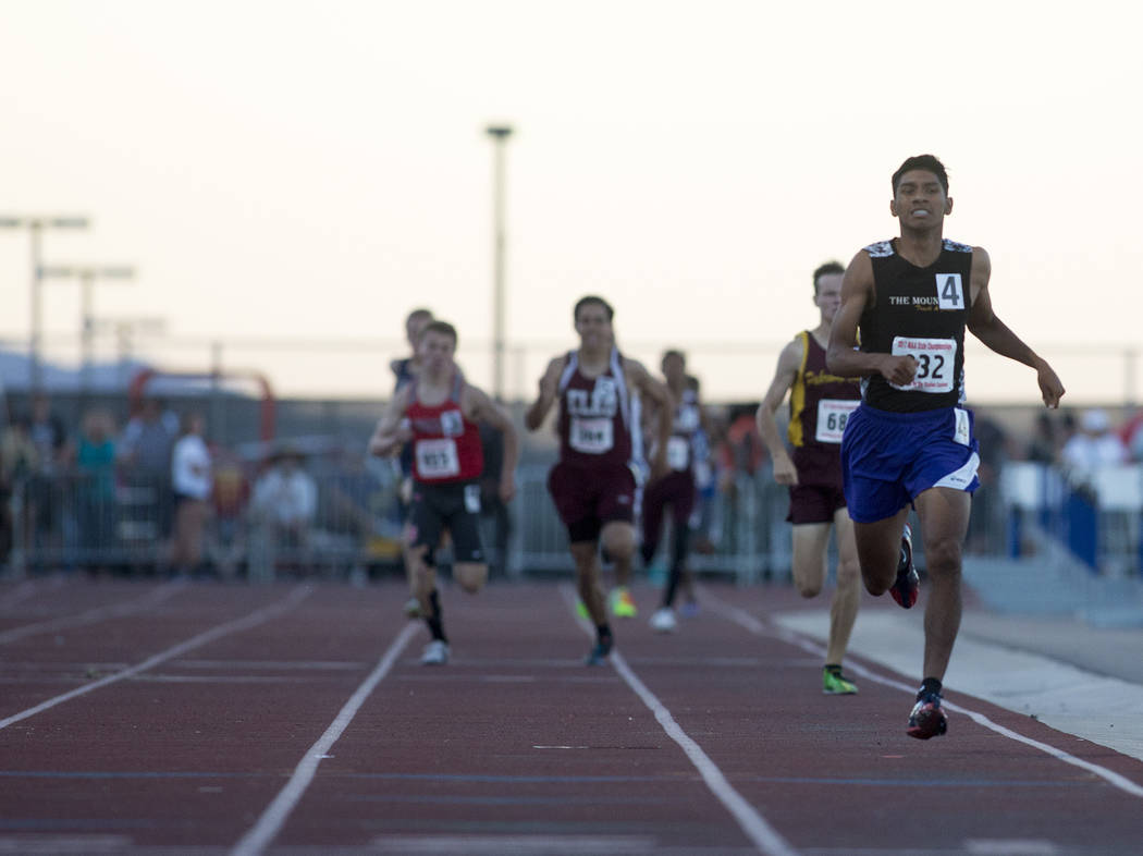 Sunrise Mountain senior Musio Jimenez-Vazquez takes takes the lead in the 3A boys 800-meter ...