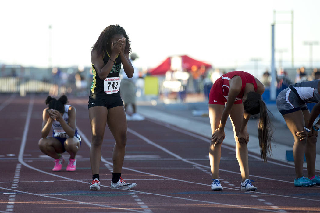 Rancho junior Gizelle Reid reacts after placing first in the girls 4A 400-meter dash at the ...