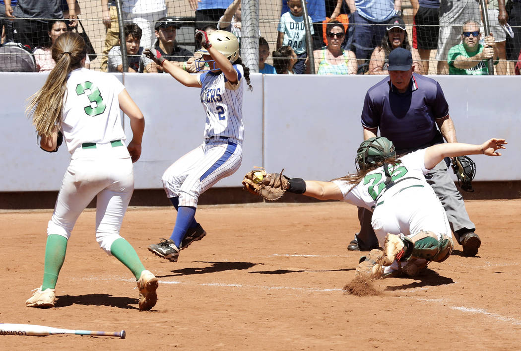 Palo Verde’s Grace Chavez, right, is unable to tag Reed’s Alyssa Hernandez durin ...