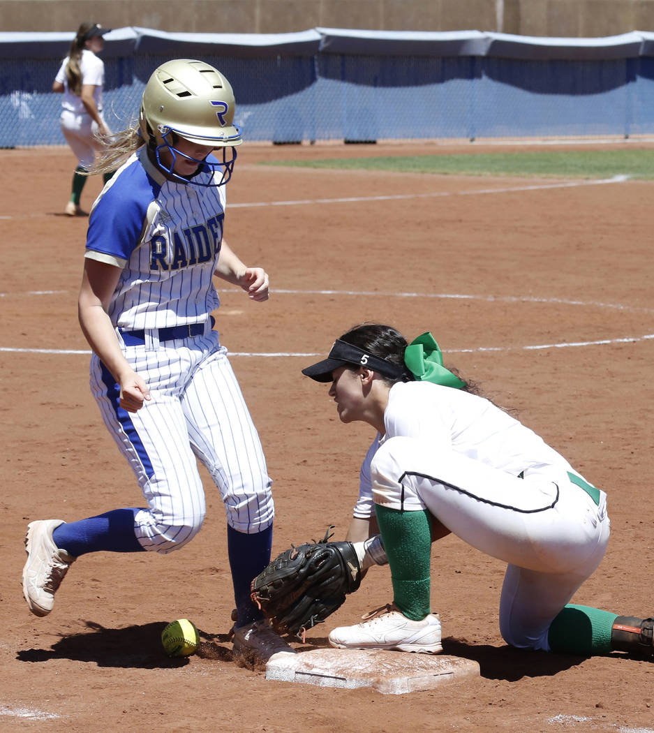Reed’s Gabby Kahl reaches first base safely against Palo Verde’s Cara Beatty dur ...