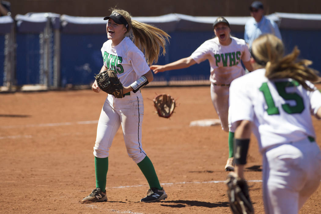 Palo Verde’s Kendall Hopkins (8), left, reacts after a strikeout to win against Reed i ...