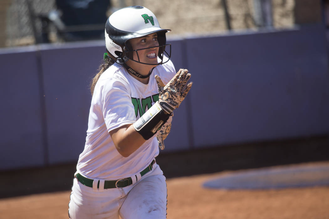 Palo Verde’s Cara Beatty (5) runs to first base after connecting with the ball against ...