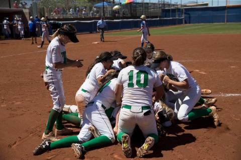 Palo Verde celebrate their 9-3 win against Reed in the Nevada Class 4A state softball final ...