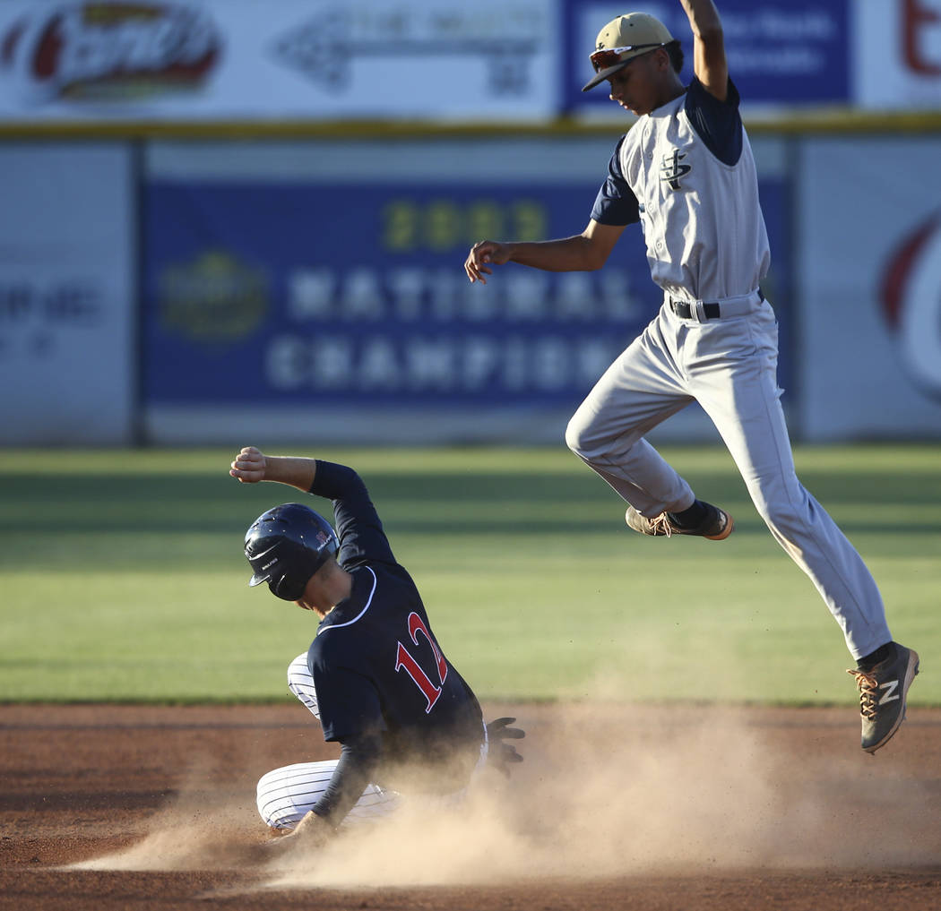 Coronado’s Landen Rowland (12) makes it to second base against Spring Valley’s J ...