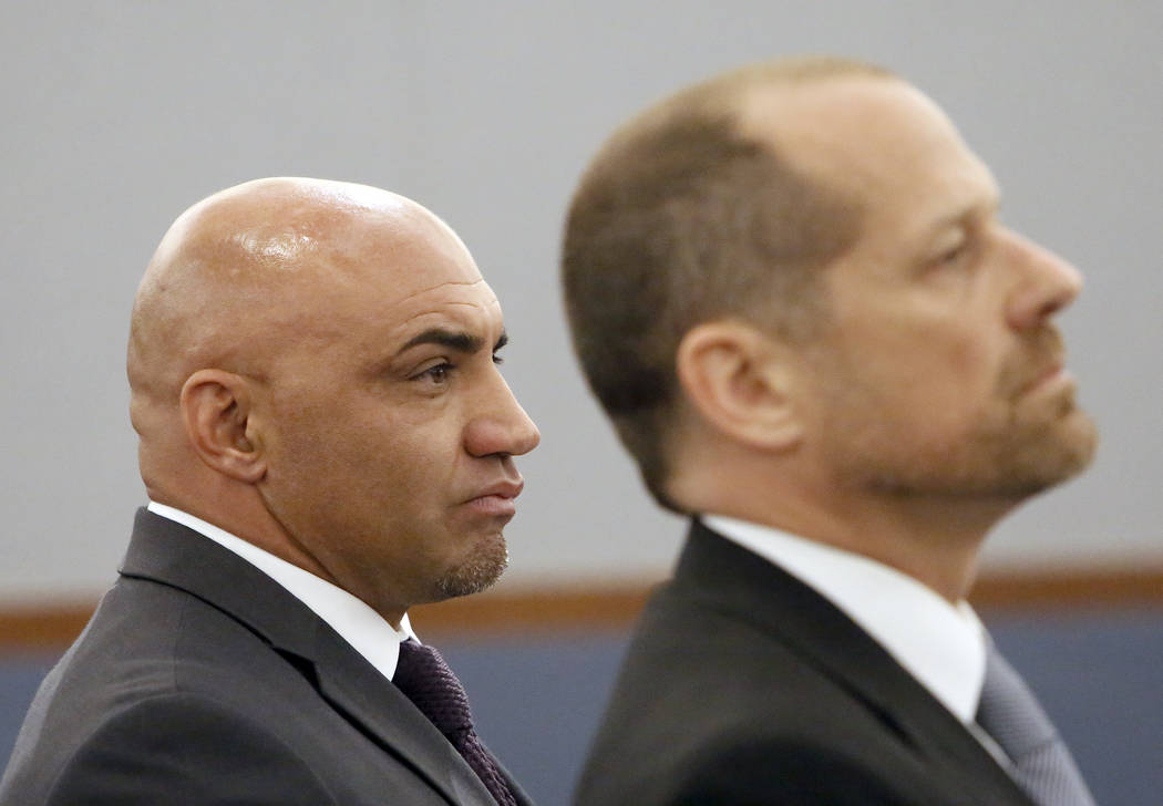 Kenny Sanchez, left, Bishop Gorman’s head football coach charged with domestic violenc ...