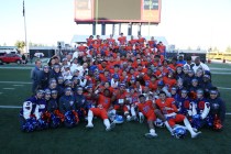 Bishop Gorman pose after their 84-8 win against Liberty in the Class 4A state football champ ...