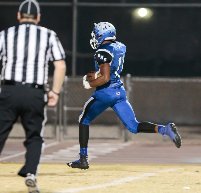 Basic senior Frank Harris (11) runs the ball in for a touchdown in a matchup against Foothil ...