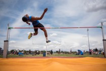 Basic’s Frank Harris competes in the high jump event during the Division I region trac ...