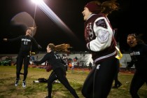 Cimarron-Memorial players, including Tiarra Del Rosario (44) and Alyssa Karpinski (17), cele ...