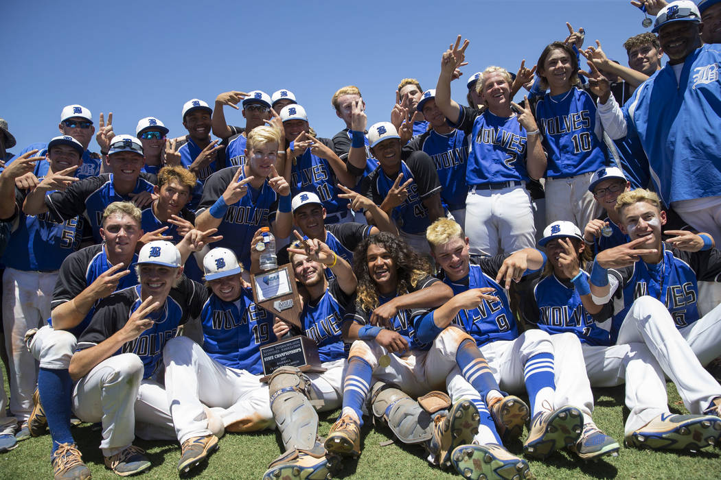 Basic players pose with their trophy after defeating Galena in the NIAA Class 4A State Champ ...