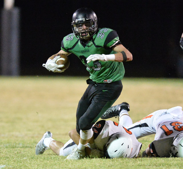 Virgin Valley running back Maurice Jayden Perkins (33) runs the ball during the Virgin Valle ...