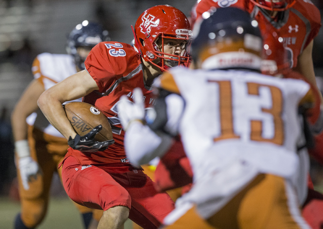 Arbor View’s Deago Stubbs (23) runs past Legacy’s Marcellus McCoy (13) during th ...