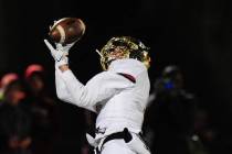 Faith Lutheran wide receiver Elijah Kothe catches a first down pass against Bishop Gorman in ...