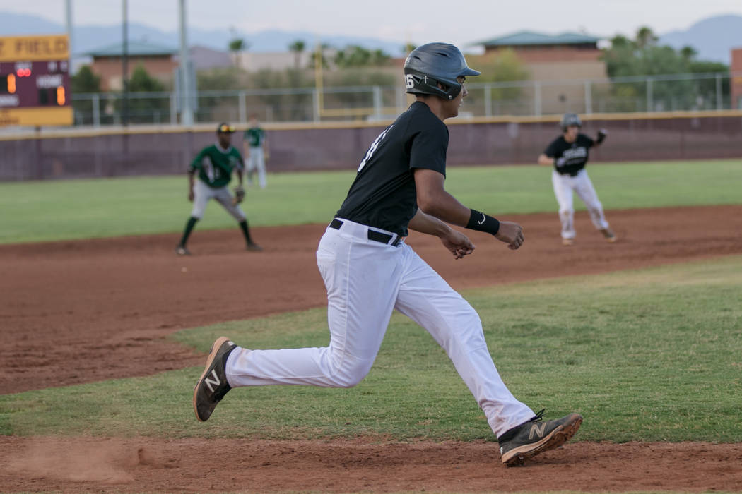 Faith Lutheran Crusader Jacob Ortega running towards home base during a game at Faith Luther ...