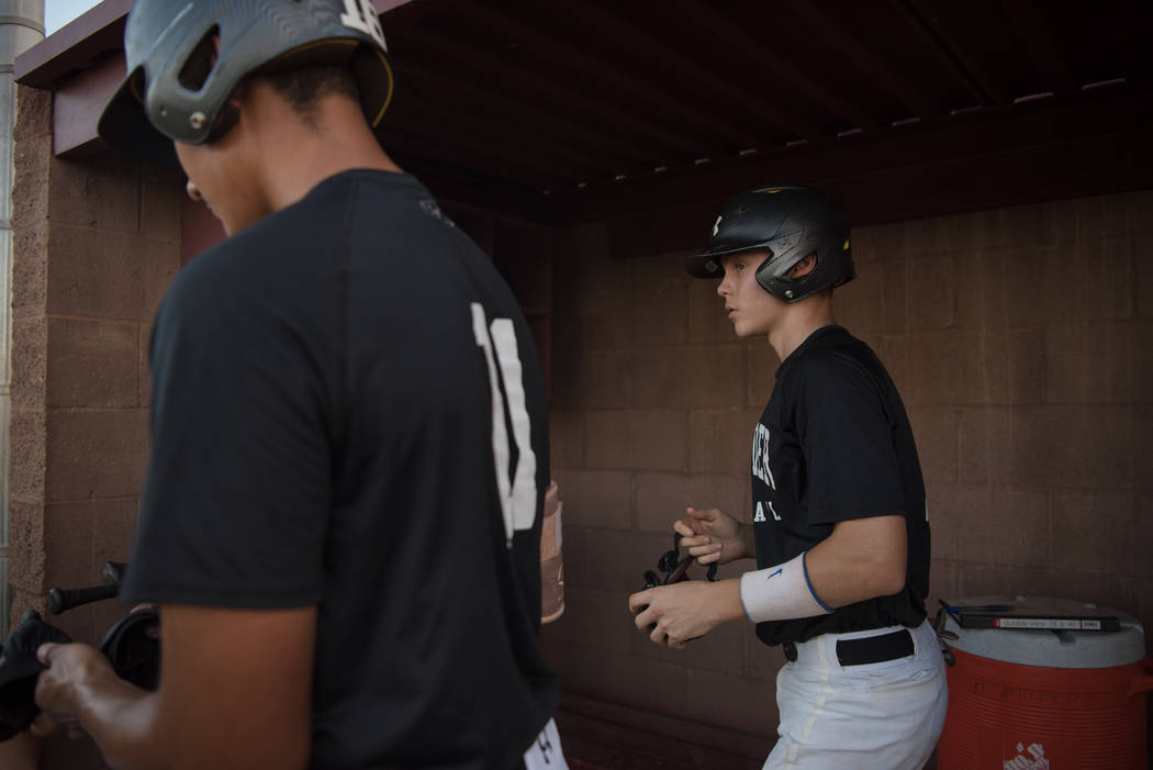 Faith Lutheran Crusader Paulshawn Pasqualotto in the dugout during a game at Faith Lutheran ...