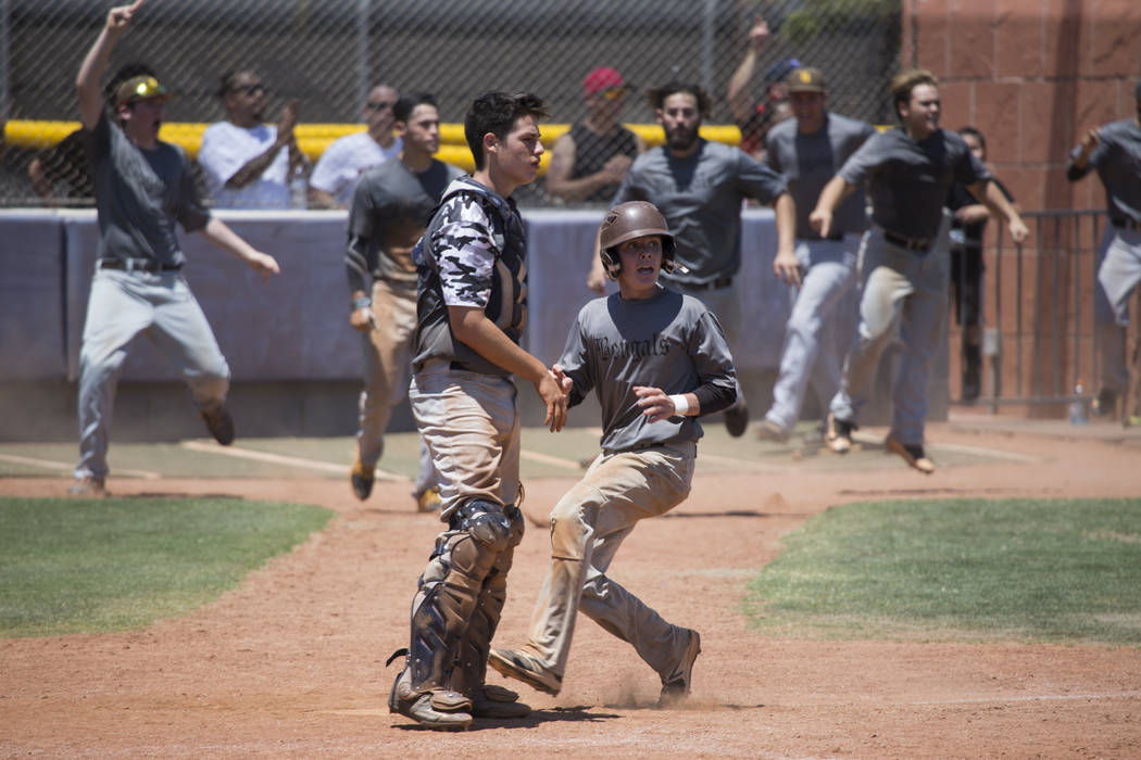 Bengals’ Nick DeSoto (10), right, runs to score the tying run run against Las Vegas Mu ...
