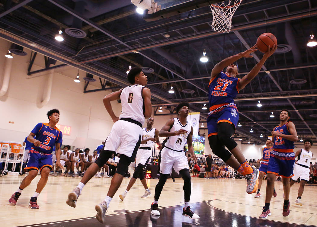 Dream Vision player Matt Mitchell goes up for a basket during an Adidas Summer Championship ...