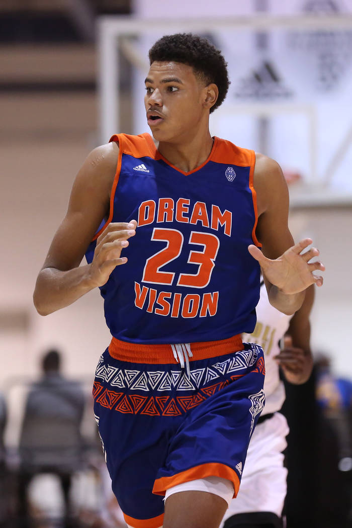 Dream Vision player Bryan Penn-Johnson travels down the court during an Adidas Summer Champi ...