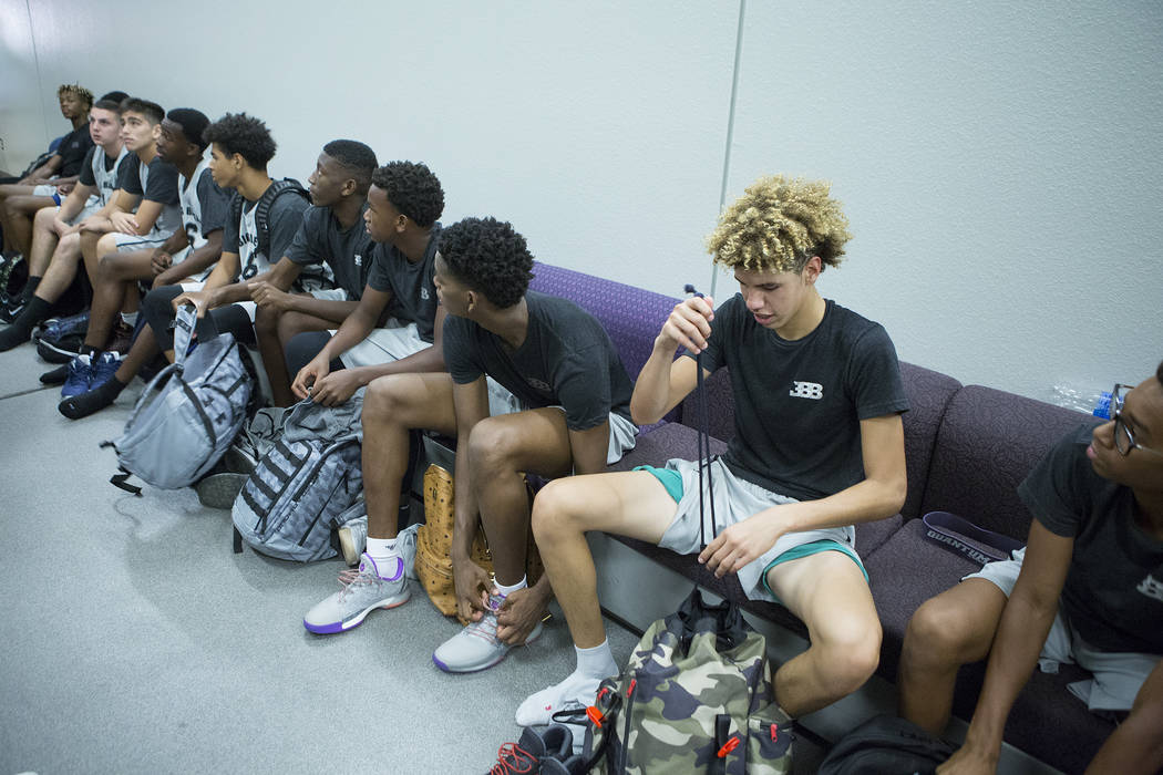 Big Baller Brand player LaMelo Ball, right, with his teammates after an Adidas Summer Champi ...
