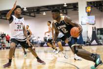 SC Supreme forward Zion Williamson (12) drives the ball under pressure from Play Hard Play S ...