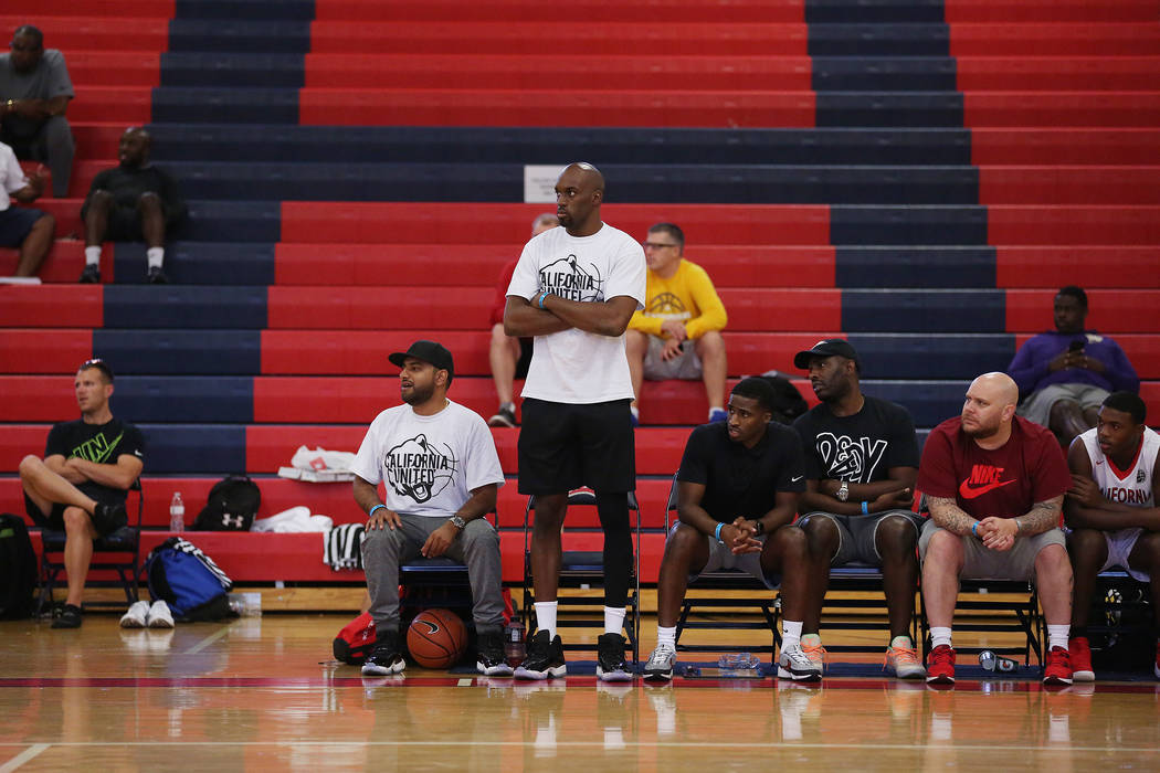 California United and NBA player Quincy Pondexter stands to watch his players during an AAU ...