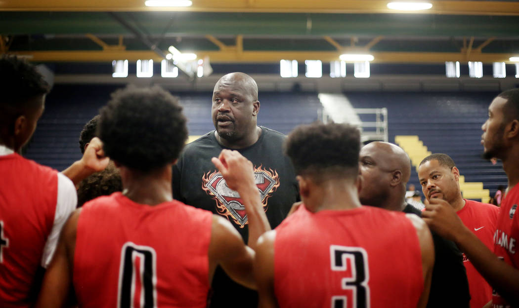 California Supreme Elite assistant coach Shaquille O’Neal speaks with his team on a ti ...