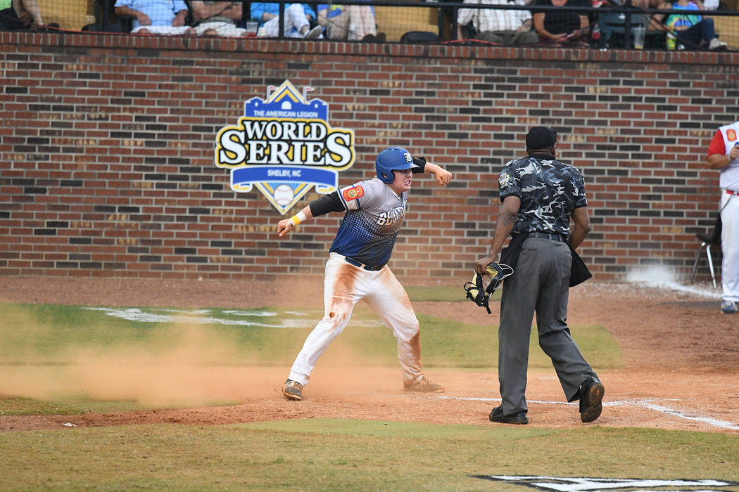 Jack Wold of Henderson, Nev., Post 40 celebrates after scoring their first run against Omaha ...