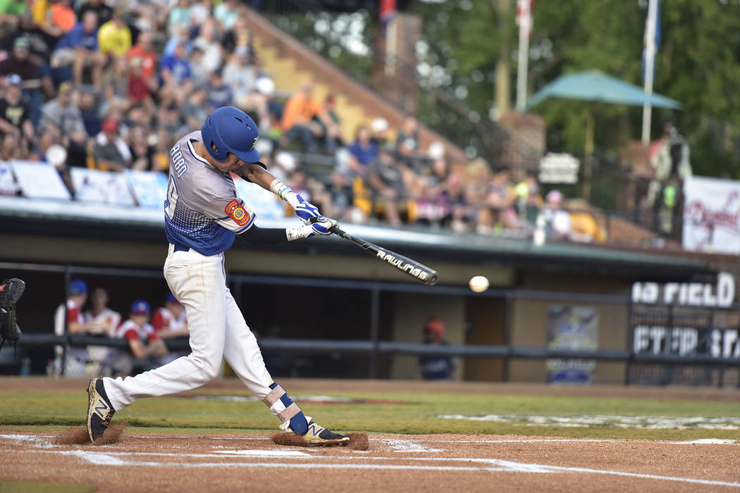 John Howard Bobo of Henderson, Nev., Post 40 starts the game off with a single against Omaha ...
