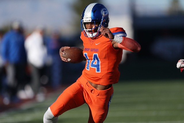 Bishop Gorman’s Dorian Thompson-robinson(14) runs for a touchdown against Liberty in t ...