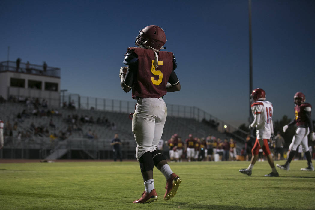 Del Sol senior Taariq Flowers walks off the filed during a three-team scrimmage at Del Sol H ...