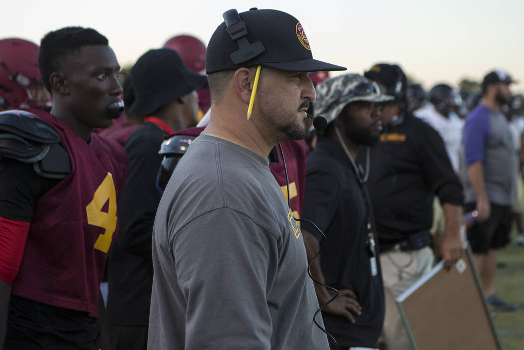 Del Sol head coach Mike Valenzuela watches during a three-team scrimmage at Del Sol High Sc ...