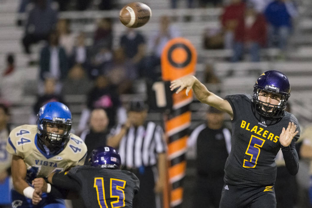 Durango quarterback Kaden Renshaw (5) makes a throw on Friday, Oct. 21, 2016, at Durango Hig ...