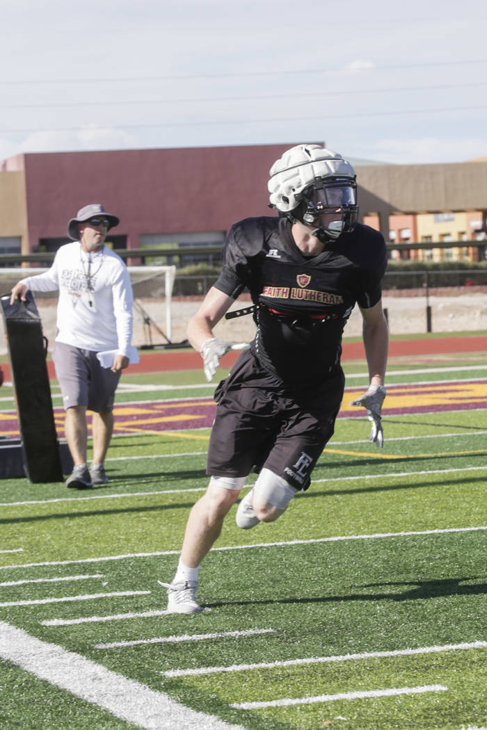 Faith Lutheran wide receiver Elija Kothe (8) runs a drill during practice at Faith Lutheran ...