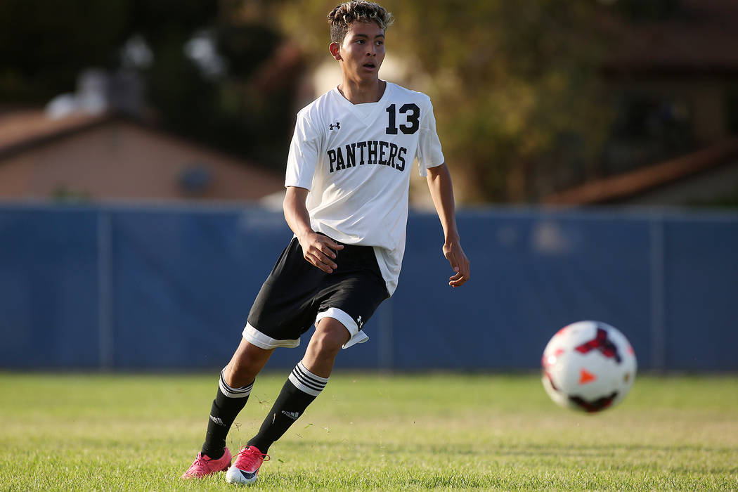 Palo Verde player Zechariah Ruffer passes the ball during a game against Faith Lutheran at G ...