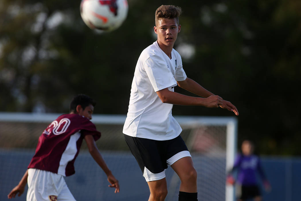 Palo Verde player Ryan Nogues passes the ball during a games against Faith Lutheran at Green ...