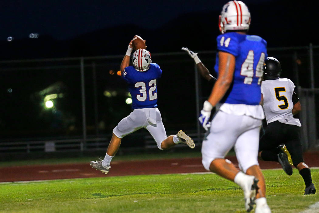 Liberty’s Kyle Beaudry (32) runs into the end zone for a touchdown as Saguaro’s ...