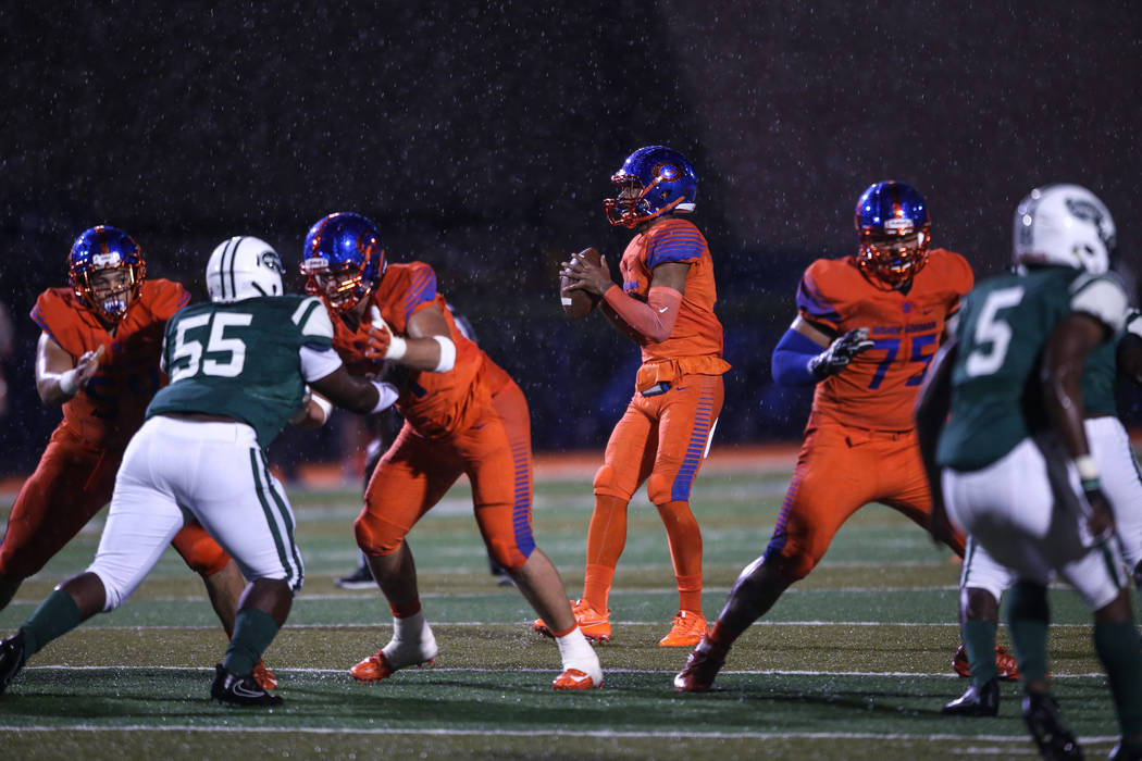 Bishop Gorman’s Dorian Thompson-Robinson (14) prepares to throw a pass against Miami C ...