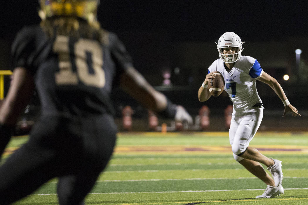 Green Valley’s AJ Barilla (7) looks for an open pass against Faith Lutheran in the foo ...