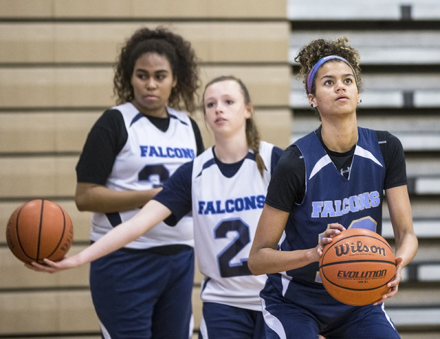 Foothill junior Rae Burrell, right, participates in shoot around at Mannion Middle School on ...