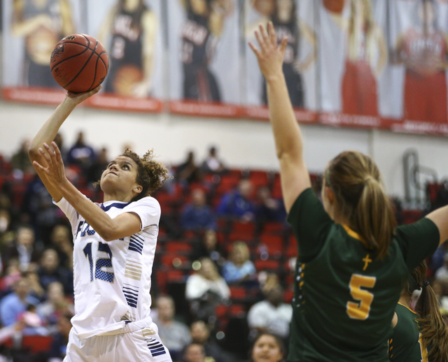 Foothill’s Rae Burrell (12) shoots against Bishop Manogue during the Class 4A girls st ...