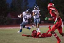 Desert Pines Jaguar wide receiver Devin McGee runs towards the sideline at Arbor View High S ...