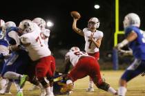 Liberty quarter back Kenyon Oblad (7) passes the ball during the first half of a game agains ...