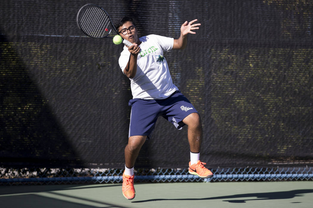 Green Valley’s Rushil Shah during his doubles match at the Darling Tennis Center in La ...