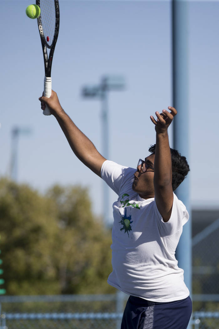 Green Valley’s Rushil Shah during his doubles match at the Darling Tennis Center in La ...